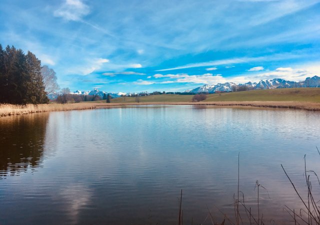 Wolken über'm Grundweiher bei Rückholz